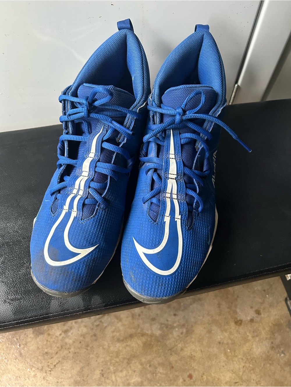 Nike Blue Athletic football cleats with White Swoosh